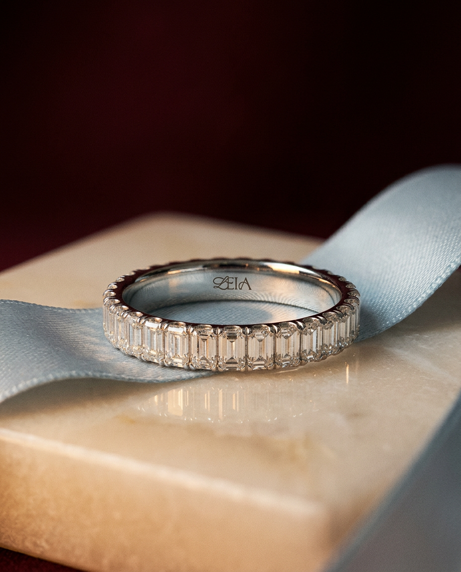 Amaterasu Ring resting on pale blue silk ribbon